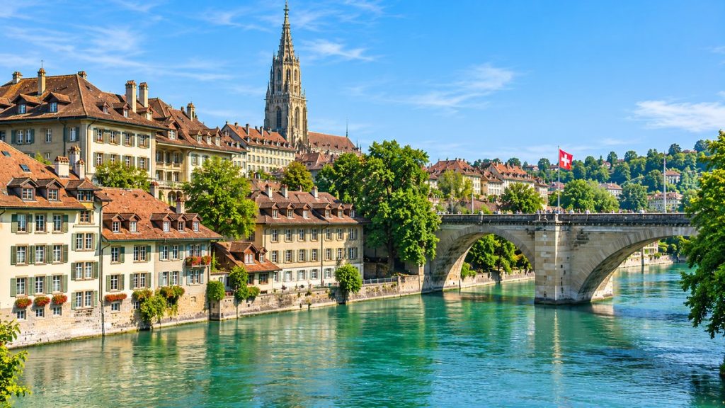 Aare River, historic buildings and Bern Minster in Bern, Switzerland