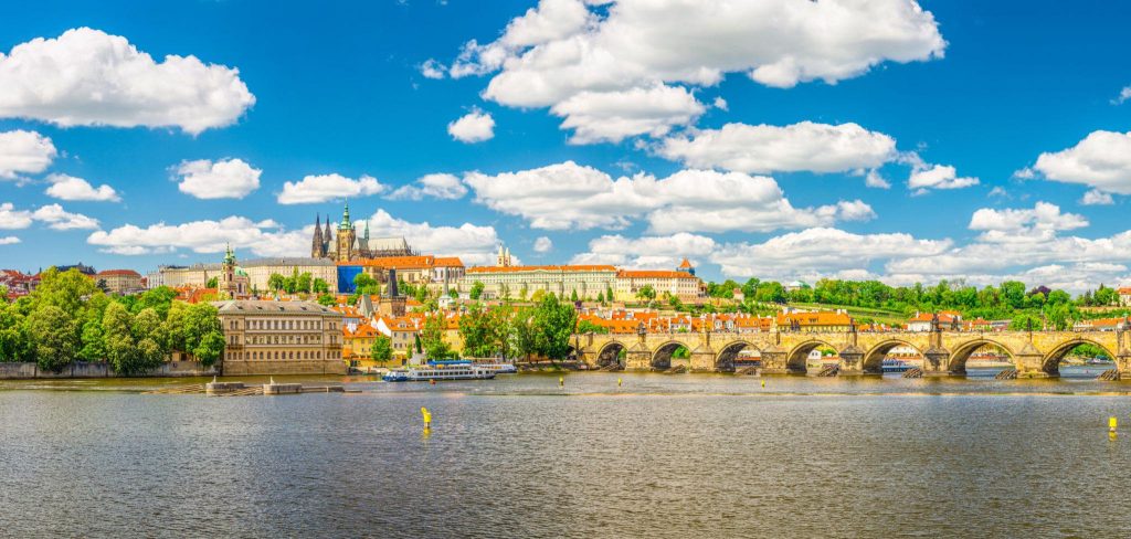 Charles Bridge over the Vltava River with Prague Castle in the background